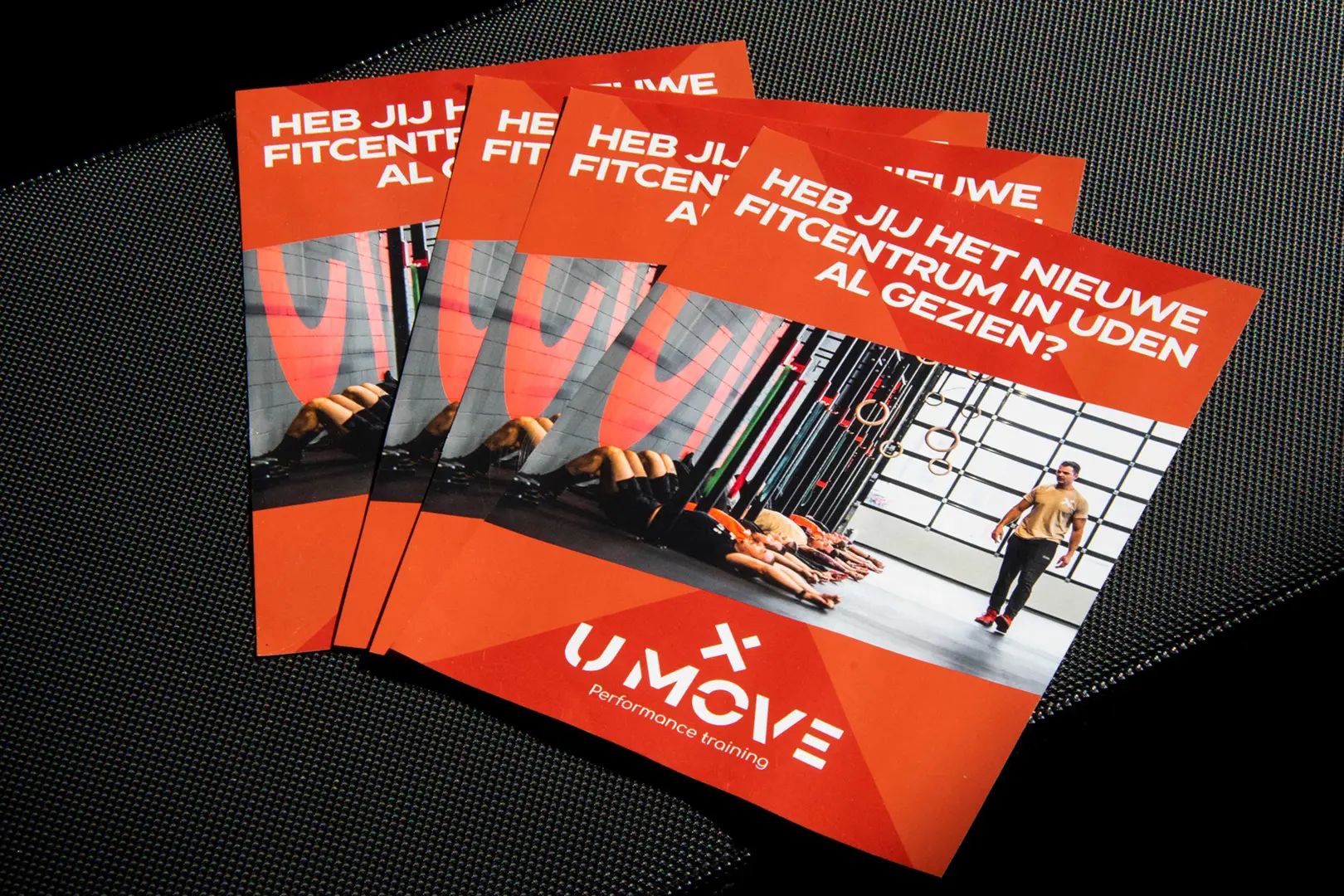 Flyers voor de opening van de nieuwe crossfit gym Umove in Uden.